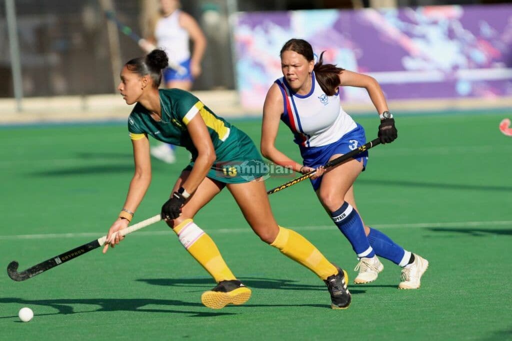 Namibia women's hockey team huddle and celebration